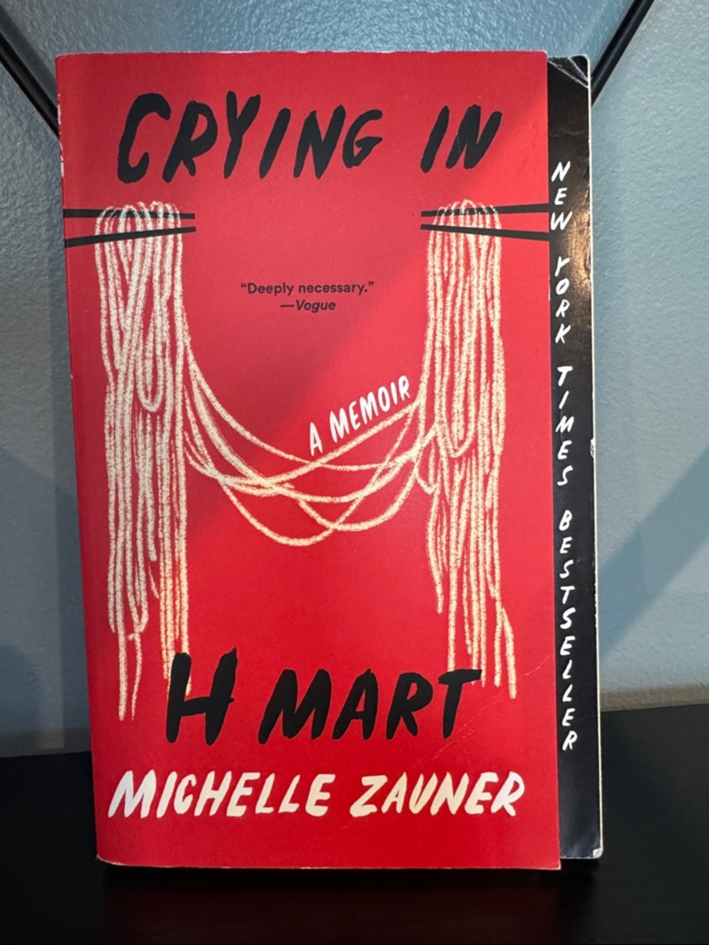 Crying in H Mart by Michelle Zauner - Red Paperback
